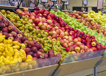 Mixed summer fruits at the grocery stands. High quality photo