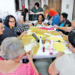 Grupo de idosos reunidos durante o Café com Artesanato na Unidade de Saúde Dom Bosco, Campo de Santana.