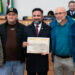 Representantes e atletas do Clube Esportivo Urano recebendo a homenagem de Votos de Congratulações na Câmara Municipal de Curitiba.