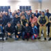 Reunião de moradores, comerciantes e representantes da Polícia Militar discutindo segurança pública na região do Xaxim.